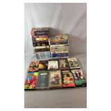 Collection of VHS movies featuring family