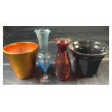 Two small decorative glass vases in blue and deep