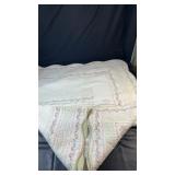 Elena Brunelli quilted bedspread featuring a