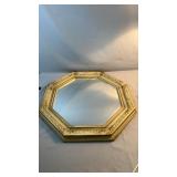 Decorative octagonal wall mirror with a wide