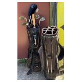 Two golf bags with a selection of clubs,