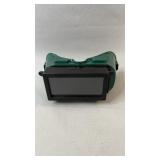Green protective welding goggles with a