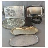 Collection of serving trays, platters, and