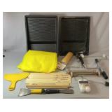 Collection of painting supplies including paint
