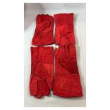 Three pairs of red leather work gloves with