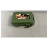 LED flashlight set housed in a green hard
