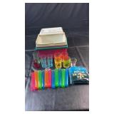 Collection of colourful drinking glasses and tall