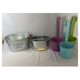 Collection of decorative metal planters including