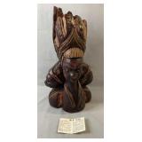 Decorative carved wooden figure featuring a
