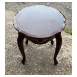 Wood accent side table with shaped top, curved