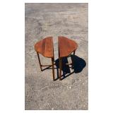 Matching pair of half-moon wooden side tables
