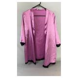 Pink satin-like house coat, size medium. Features