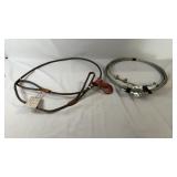 Two heavy-duty wire rope cable assemblies of
