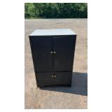 Tall black wooden storage cabinet with two large