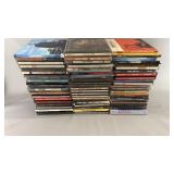 Large collection of music CDs featuring artists