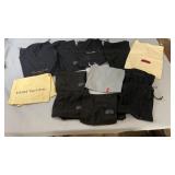 Collection of designer dust bags and storage