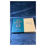 Two hardcover books featuring Tom Sawyer by Mark