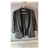 Gray Rickiï¿½s blazer, size large, with