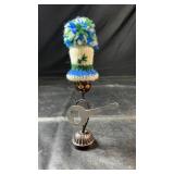 Small decorative musician figurine featuring a