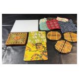 Collection of kitchen trivets and pot holders