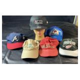 Collection of six baseball caps featuring Atlanta