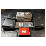 Collection of music CDs featuring John Lennon,