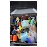 Large collection of sewing supplies stored in a