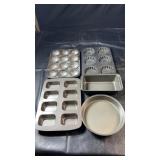 Collection of metal bakeware including Bakerï¿½s