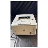 HP LaserJet Pro M118dw monochrome laser printer.