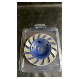 Diamond grinding cup wheel in protective plastic
