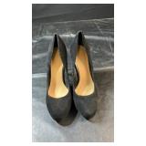 Pair of black fabric-covered pumps, size 10,