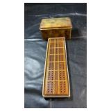 Wooden cribbage board with decorative