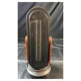 Compact tower-style fan heater with an