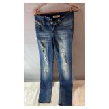 82 jeans, size 5, featuring distressed detailing,