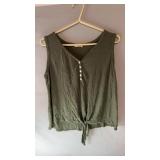 Green sleeveless top with button-front detail and