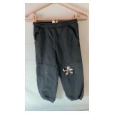 Black Mickey Mouse jogger-style pants with