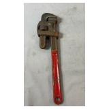 Heavy-duty adjustable pipe wrench with red handle