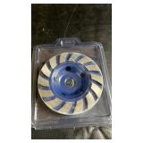 Diamond grinding cup wheel in protective plastic