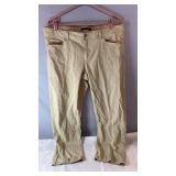 Light tan Calvin Klein Jeans pants, size 16, with