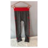 Gray athletic leggings with red waistband,