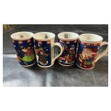 Set of four ceramic Christmas mugs featuring