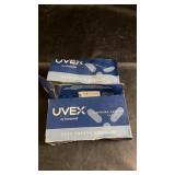 Two boxes of Uvex by Honeywell safety goggles for