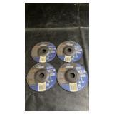 Four Norton Gemini grinding wheels for