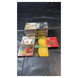 Collection of music CDs with a variety of artists