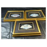 Three decorative fan art pieces featuring