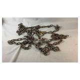 Heavy-duty metal chains with attached hooks,