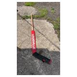 Louisville 2625R wooden hockey stick with red and
