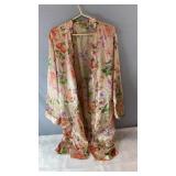 Satin-style housecoat with peach, pink and purple