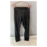 Black Pink leggings, size Medium, with an