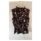 Black sleeveless shirt with red, pink and white